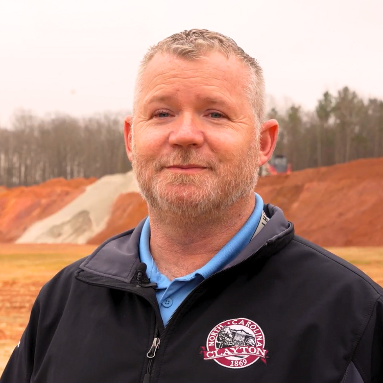 Michael Worner standing in front of construction site