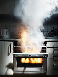 An oven that is on fire