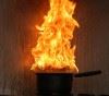 A flaming cooking pot